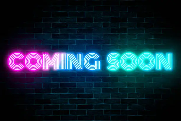 Photo of Coming Soon neon banner light signboard.