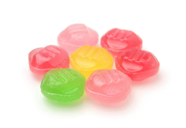 istock Colorful candies isolated on white. 1407866058
