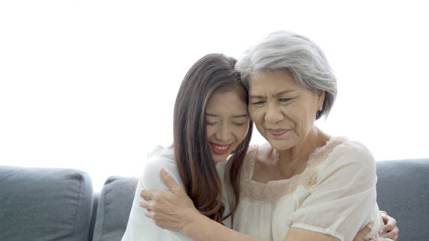 istock Daughter taking care her mother. 1407866632