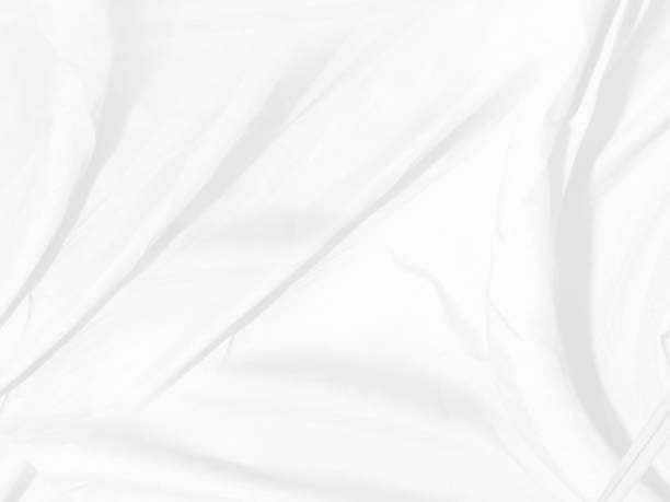 istock Clean soft white fabric woven abstract smooth curve shape decorative fashion textile background 1407868630