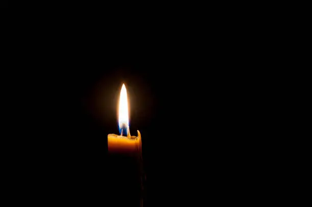 Photo of burning candle