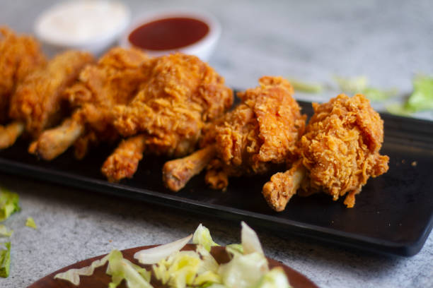 chicken lollipop grilled tandoor tandoori non veg with schezwan dip chutney on side selective focus. - non veg imagens e fotografias de stock