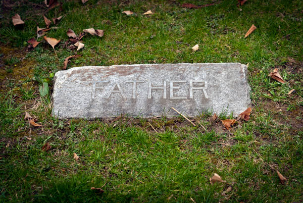 istock Grave stone with the word Father 1407880290