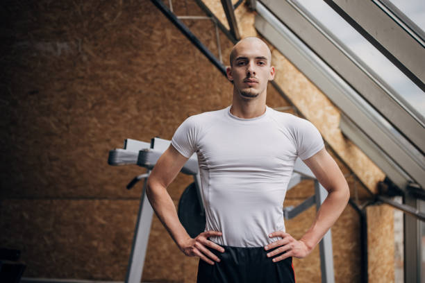 istock Fit man in gym 1407883223