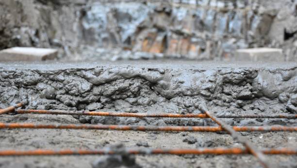 Iron slab with newly cast concrete layer.