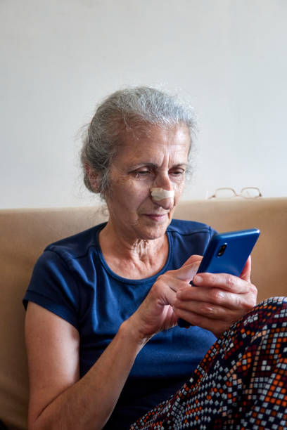 istock Senior Woman Using Smart Phone 1407888758