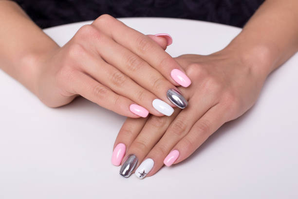 istock Female hands with colourful manicure nails 1407894014