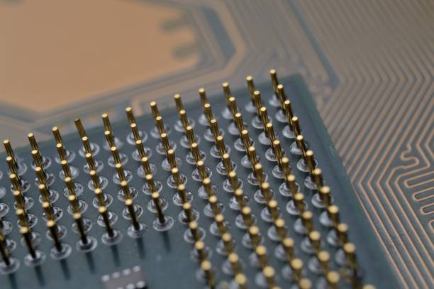 istock microprocessor on the background of the microcircuit of the motherboard. 1407896968