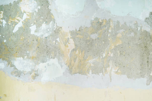 Old painted concrete wall texture. Grunge background with space for design. Close-up.