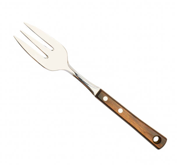 istock Stainless steel fork with wooden handle, close-up, isolated on white background 1407897406