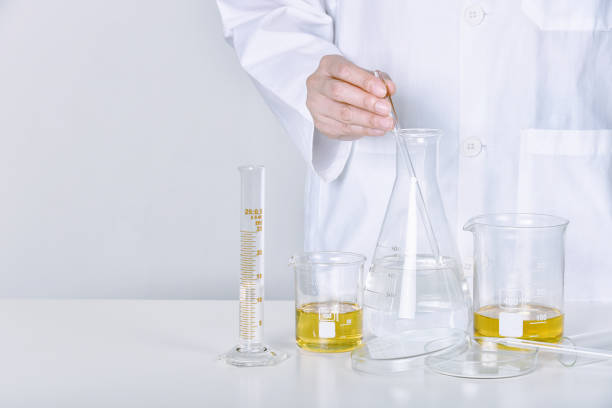 istock Chemical substance mixing, Laboratory and science experiments, Formulating the chemical for medical research, Quality control of petroleum oil industry products concept. 1407897570