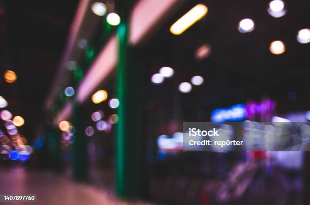 Storefronts In Night Street Defocused Stock Photo - Download Image Now - Night, Store Window, Abstract