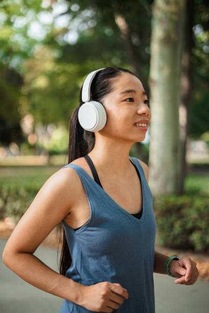 istock Asian sport girl running 1407898556