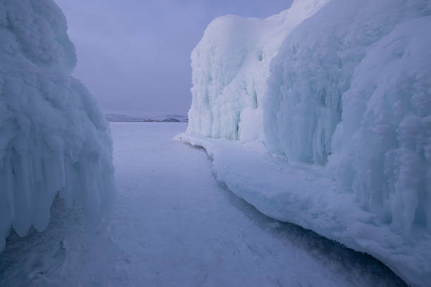 istock broken ice sheets on frozen lake 1407898723