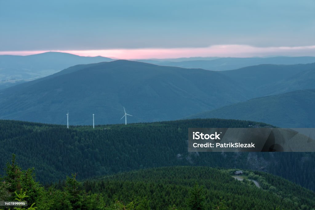 Wind turbines in Bear mountain , view from upper water reservoir of the pumped storage hydro power plant Dlouhe Strane in Jeseniky Mountains, Czech Republic. Summer sunset. Wind turbines in Bear mountain , view from upper water reservoir of the pumped storage hydro power plant Dlouhe Strane in Jeseniky Mountains, Czech Republic.
Summer sunset. Bear Mountain Arena Stock Photo