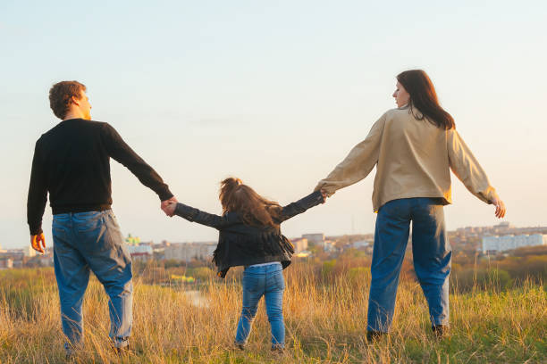 istock young family share a child 1407900083