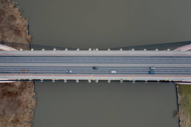 istock bridge over the river  from a drone from the top 1407900145