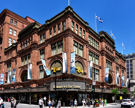 Montreal, Canada - July 3, 2022: Hudsons Bay, aka The Bay, store on Saint-Catherine St. The department store chain is the flagship brand of the Hudson's Bay Company (HBC), the oldest and longest-surviving company in North America