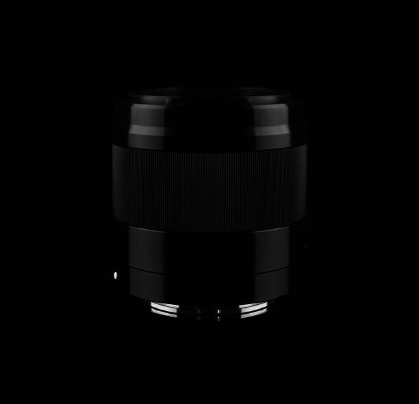 istock camera lens on a black background isolated 1407904225