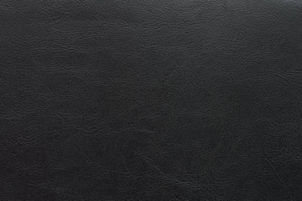 Genuine quality black leather Genuine quality black leather surface macro close up view leather stock pictures, royalty-free photos & images