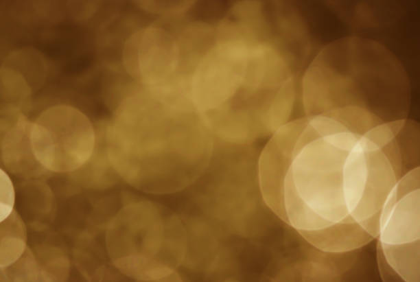 Light abstract dark bokeh christmas circle color glitter blurred black background