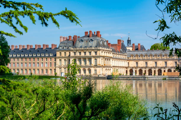 Fontainebleau palace and gardens outside Paris, France Fontainebleau, France - May 2019: Fontainebleau palace and gardens outside Paris chateau de fontainbleau stock pictures, royalty-free photos & images