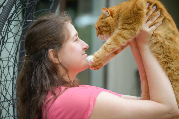 woman with british shorthair cat