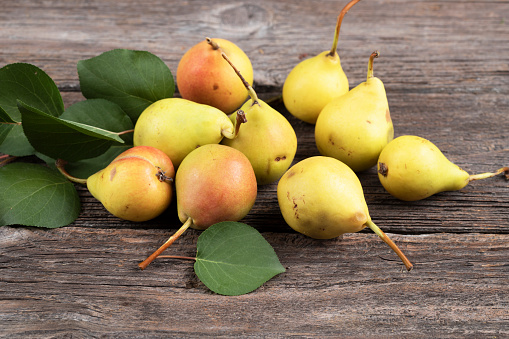 Pears on  wooden background