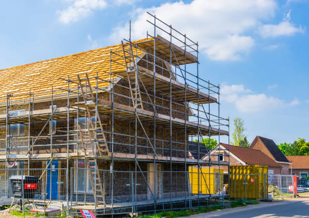 house with jetty, construction of a neighborhood, Rucphen, The Netherlands, 6 may, 2022 house with jetty, construction of a neighborhood, Rucphen, The Netherlands, 6 may, 2022 jetting stock pictures, royalty-free photos & images