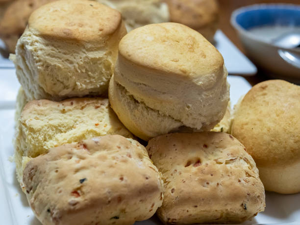istock Freshly baked miniature bread buns and rolls 1407921712