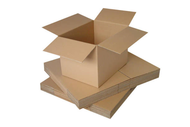 istock Lots of brown cardboard boxes. Cardboard mailbox isolated on a white background. Open rectangular small brown box for transporting goods isolated on a white background, front view. Recycled paper 1407922551