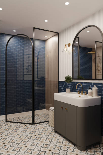 istock 3d rendering. Corner of hotel bathroom with blue tiled walls, large mirror, pattern on the floor and shower. Classic style. 1407925127
