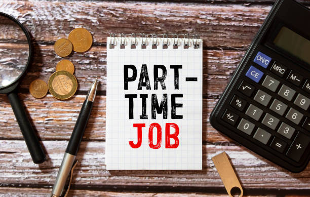 istock PART-TIME JOB text on sticker on yellow notebook with chart and pen 1407925994