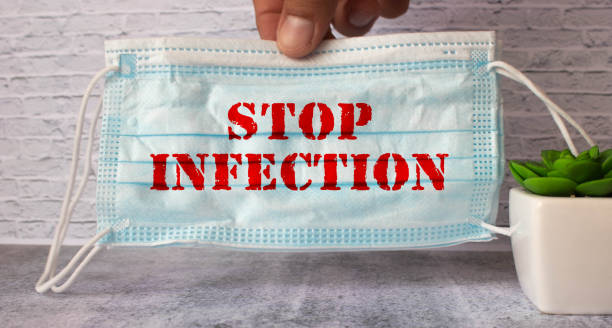 istock on which there is a sticker with the inscription - STOP INFECTION 1407925996