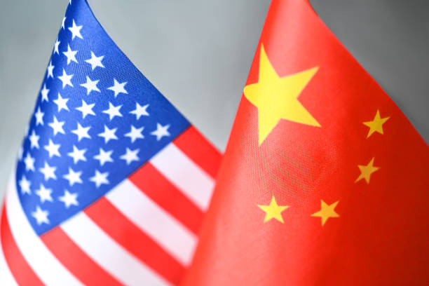 istock USA and Chinese flags 1407926669