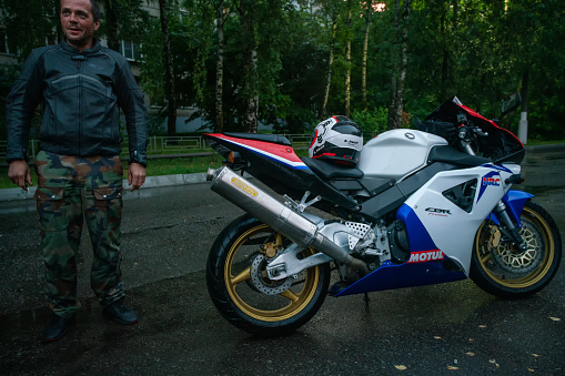 Honda  bike in Russia and driver   in summertime  -  sportbike. He  say that  maximal speed about 200  km he  drive in Russia ( with  not very good   highways)