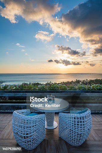 istock Table with two chairs with view to the sunset 1407928690