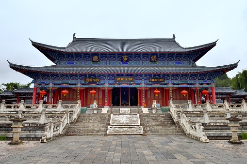 Historical buildings in Beihai Park, Beijing, China. It is a traditional Chinese royal Buddhist building. It is surrounded by archways and the main hall in the middle.