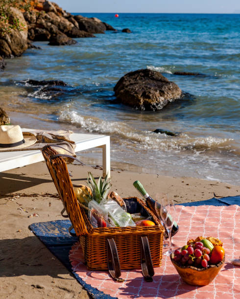 istock Picnic basket by the sea. 1407932414