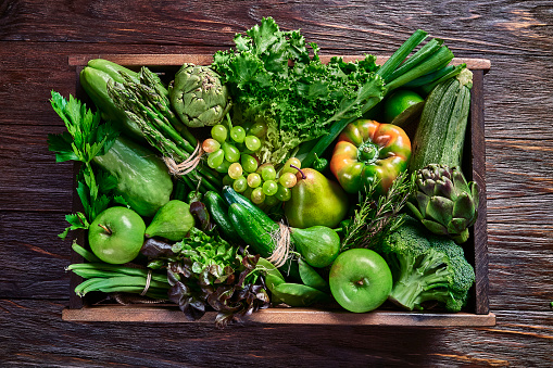 Fresh garden vegetables composition. Pepper, onion, cucumber, tomato, thyme and garlic isolated on white background. Healthy eating and dieting concept. Creative layout. Flat lay, top view