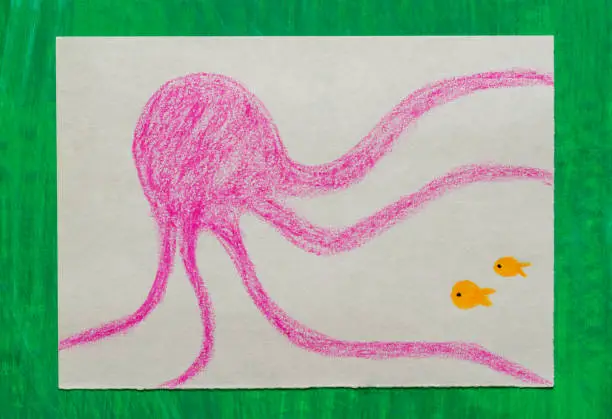 Photo of Child's Drawing -Octopus and small fish on the sea floor