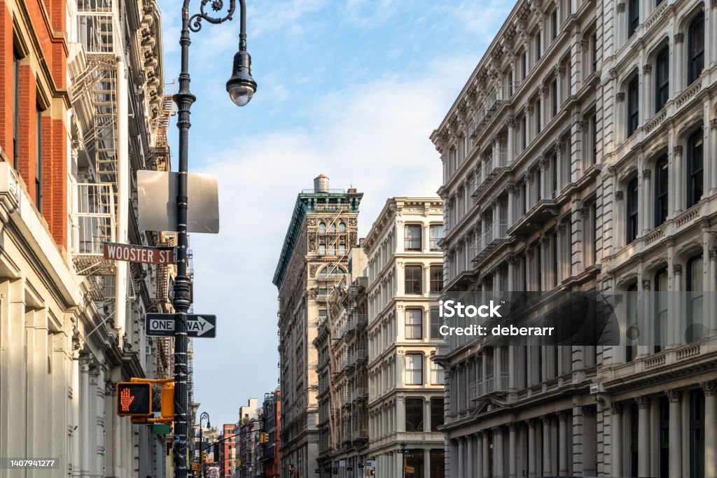 Old buildings at the intersection of Broome and Wooster Streets in the SoHo neighborhood of New York City Old buildings at the intersection of Broome and Wooster Streets in the SoHo neighborhood of New York City NYC SoHo - New York Stock Photo