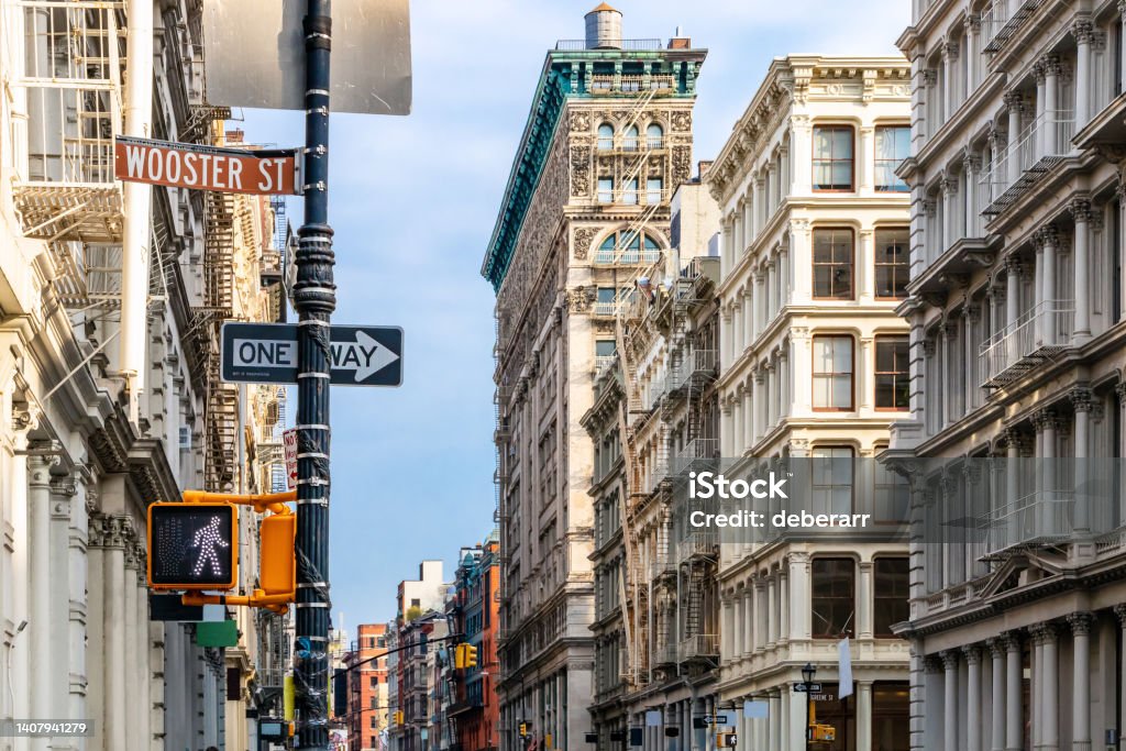 Block of old buildings on Broome and Wooster Streets in the historic SoHo neighborhood of Manhattan in New York City Block of old buildings on Broome and Wooster Streets in the historic SoHo neighborhood of Manhattan in New York City NYC SoHo - New York Stock Photo