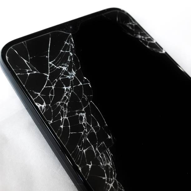 istock The phone screen cracked from falling on the floor 1407944448