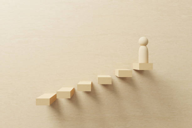 istock Growth or increase design concept. Cube block staircase moving step growing up with wood human on top. Success achievement or goal business motivation. 3d illustration 1407944584