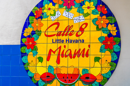 Colorful Sign Calle Street Ocho or 8 Little Havana Miami Florida Calle 8 is the center of  Little Havana where many Cuban Americans South Americans live and meet