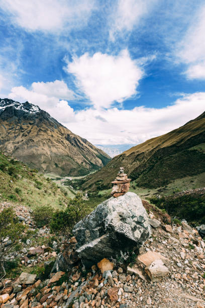 istock Cairn on Andean mountain range along Salkantay pass 1407954122