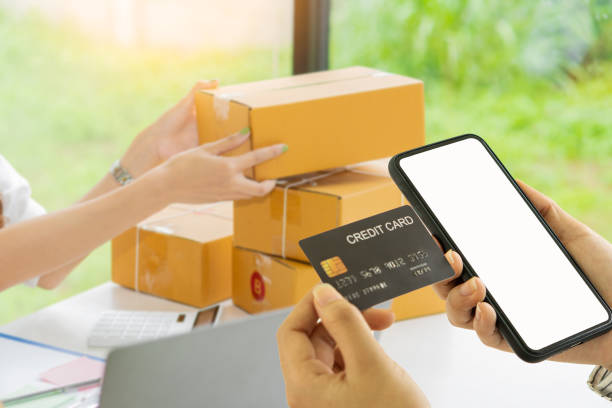 istock Startup Freelance Small Business Entrepreneur, Work From Home Computer, Online, Marketing, Packaging, Shipping, SME, Goods Ready Ecommerce Concept Mailbox with Smartphone with Blank White Screen 1407955114
