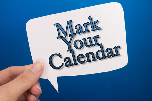 Speech bubble in front of colored background with Mark Your Calendar text.