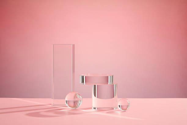 istock Front view of transparent podium decorated with pink background 1407958664